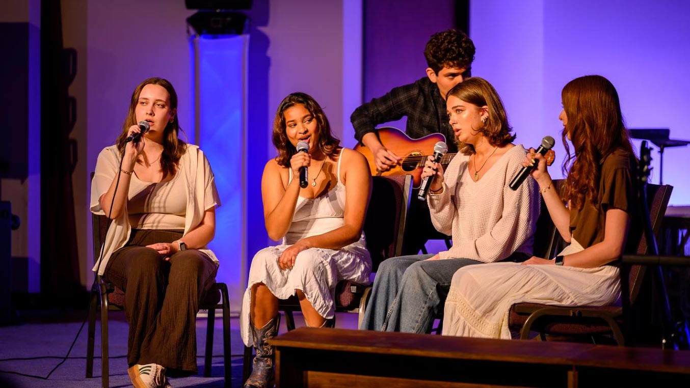 Small group of Century Singers performing at showcase